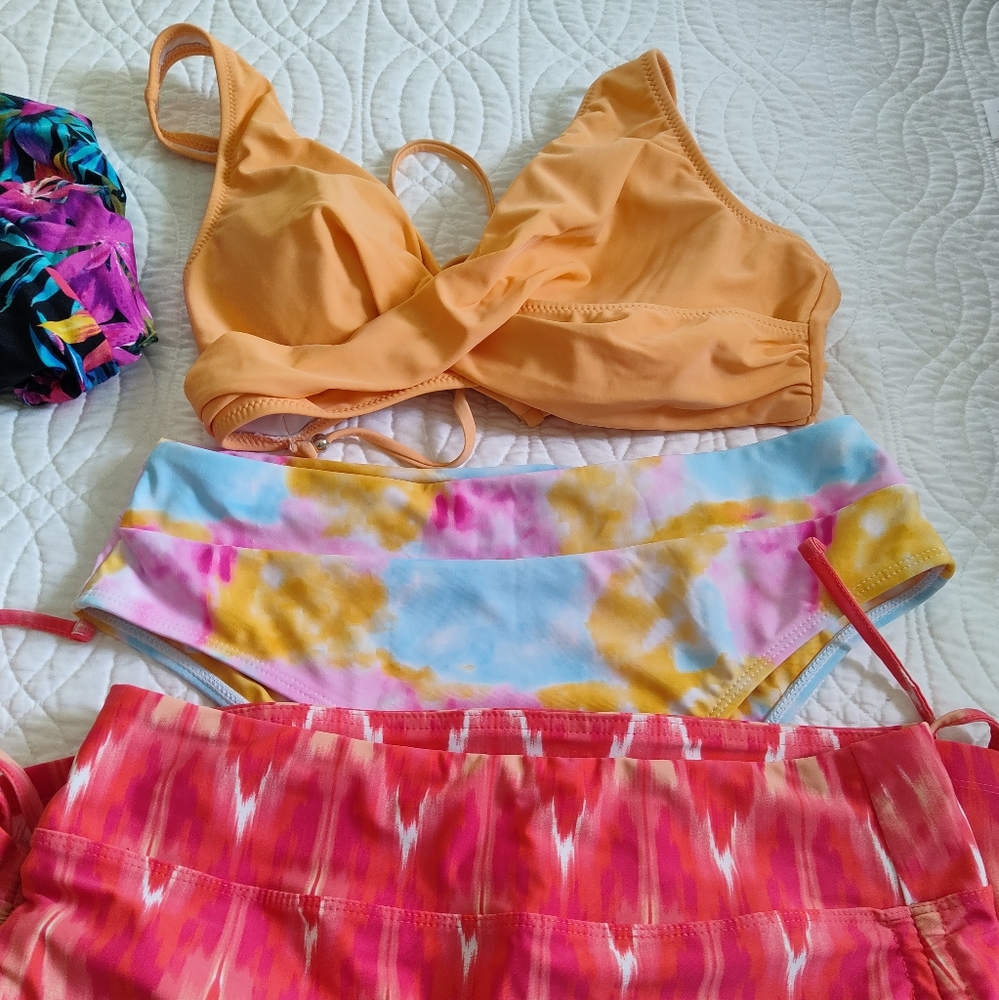 Bundle 4 pieces. Two Bikini  tops. 1 bottom and 1 skirt